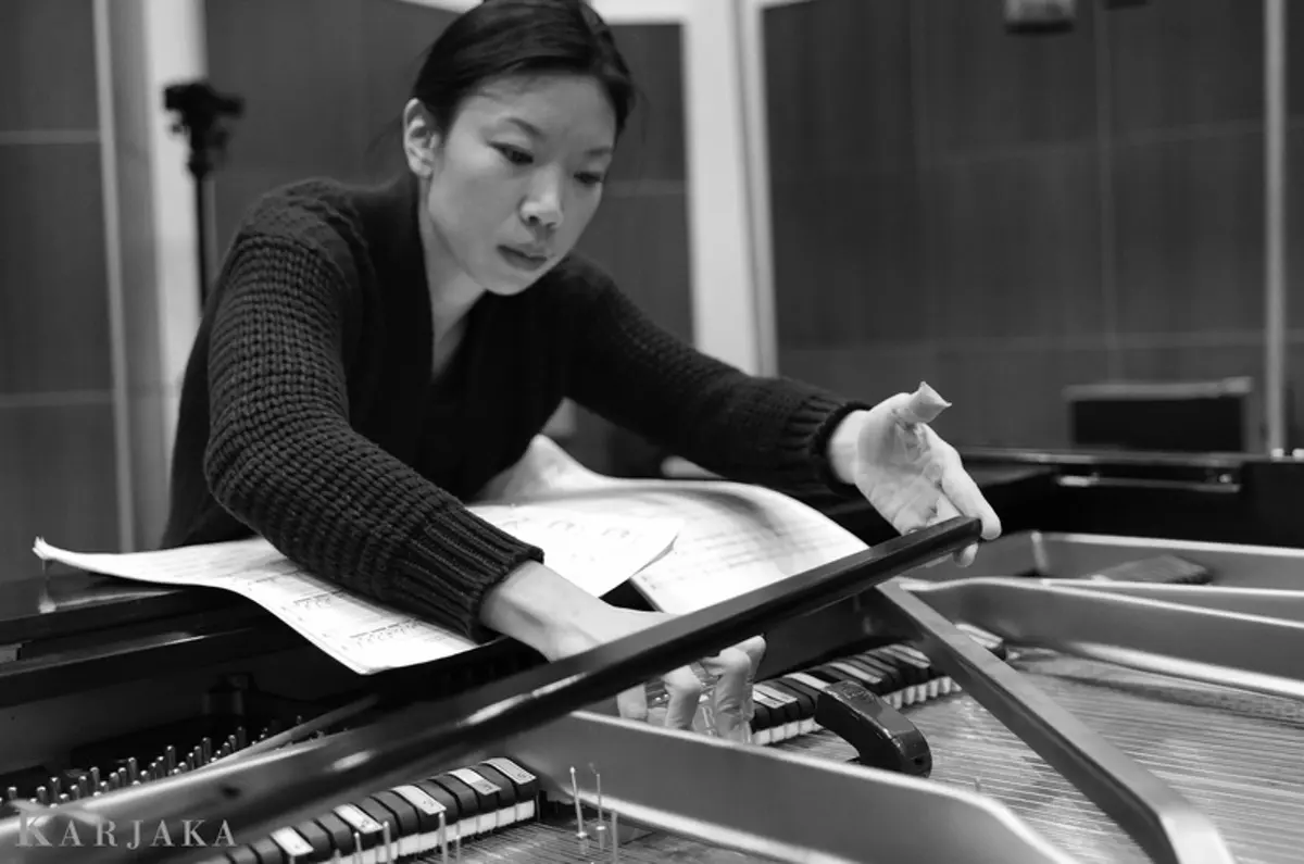 Mabel Kwan playing piano